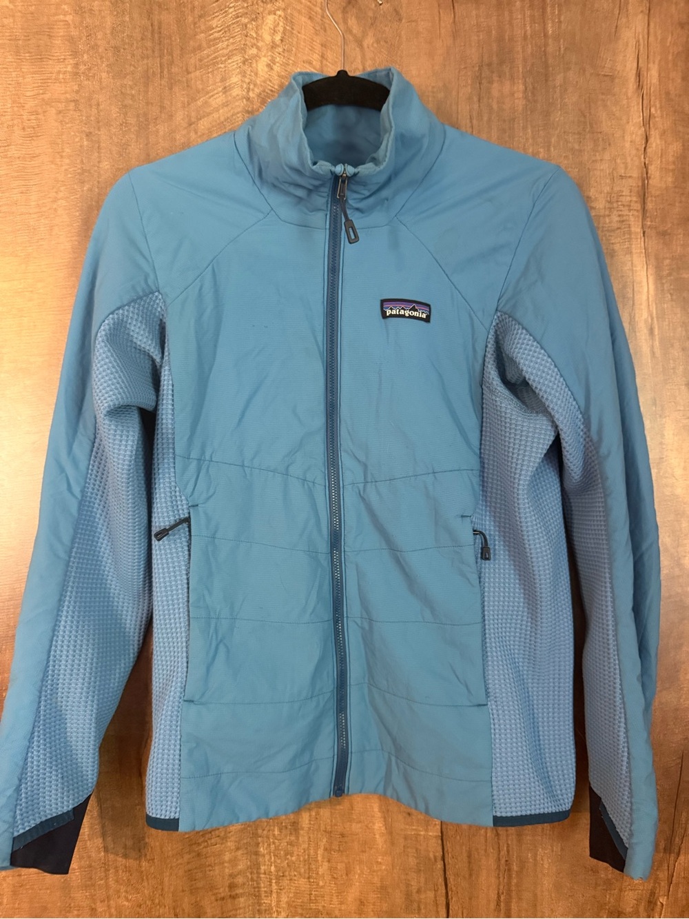 Patagonia Blue Jacket with Multicolor Logo Patch